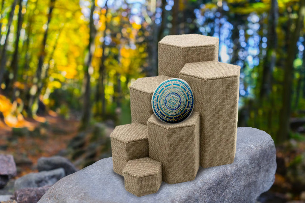 Mandala Stone Resting on a Burlap Riser